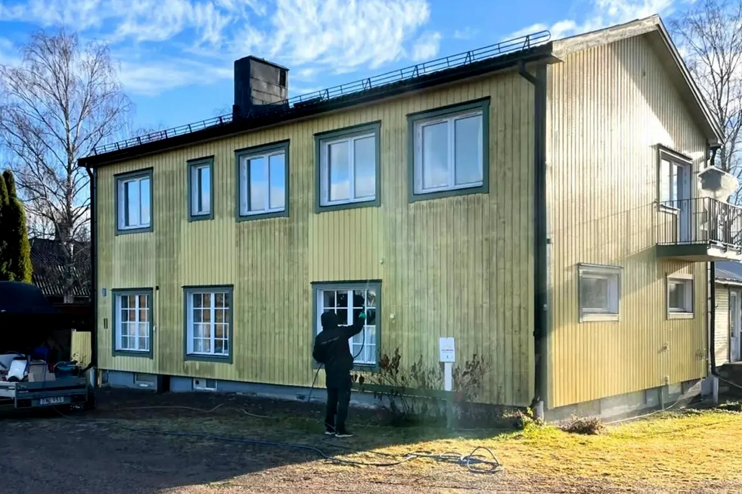 Tvätta träfasad